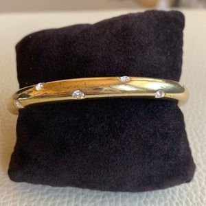Gold tone bracelet with cubic zirconia